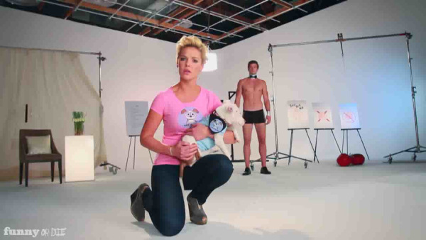 Register-Her has accused Katherine Heigl of being a man-hating bigot who "endorses male targeted sexual mutilation."