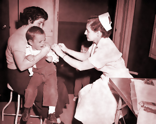 Lazy nurse giving totally unnecessary smallpox vaccination just to kill some time at her makework job.