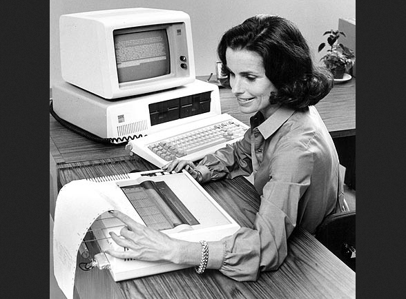 Evil woman printing out evil office sex list.