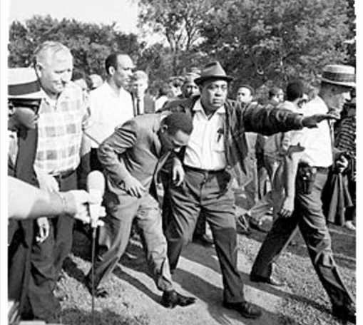Martin Luther King after being hit by a rock during a demonstration in Chicago, 1966